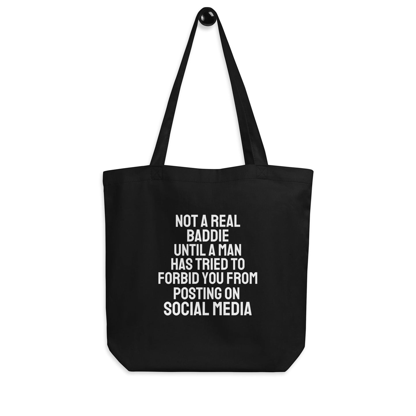 Organic cotton tote bag with a bold NOT A REAL BADDIE UNTIL statement. Spacious, durable and made for everyday essentials with savagee energy.