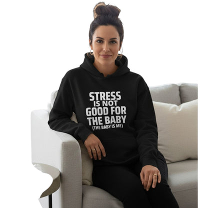 Frau trägt einen schwarzen spiritualsavagee Unisex-Hoodie mit weißem Aufdruck Stress is not good for the baby